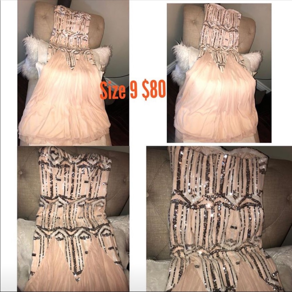 Long prom blush colored with silver decals dress!